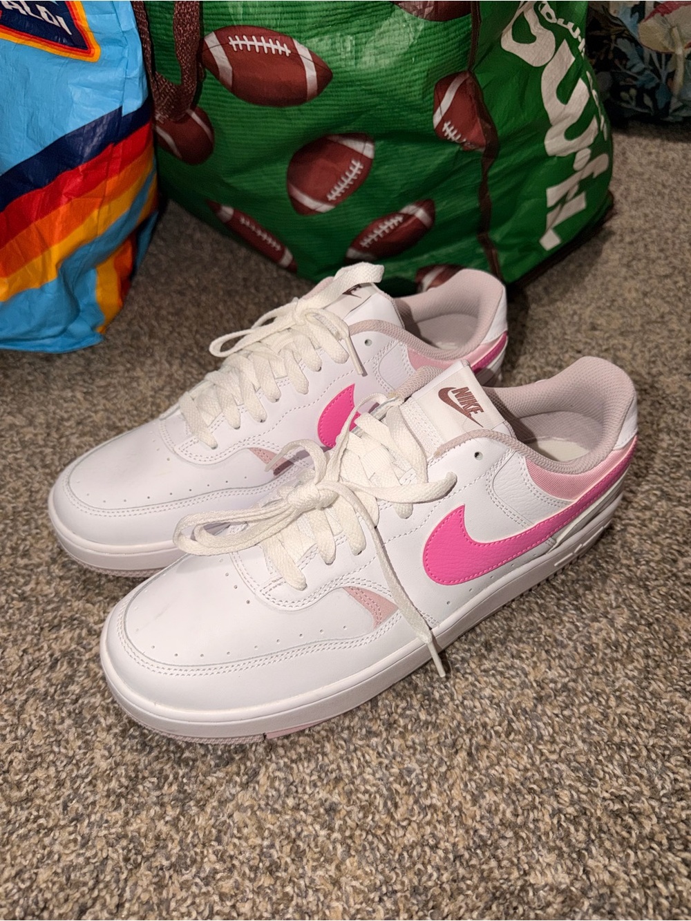 Nike Women’s White Sneakers with Pink Swoosh and Pale Pink Accents